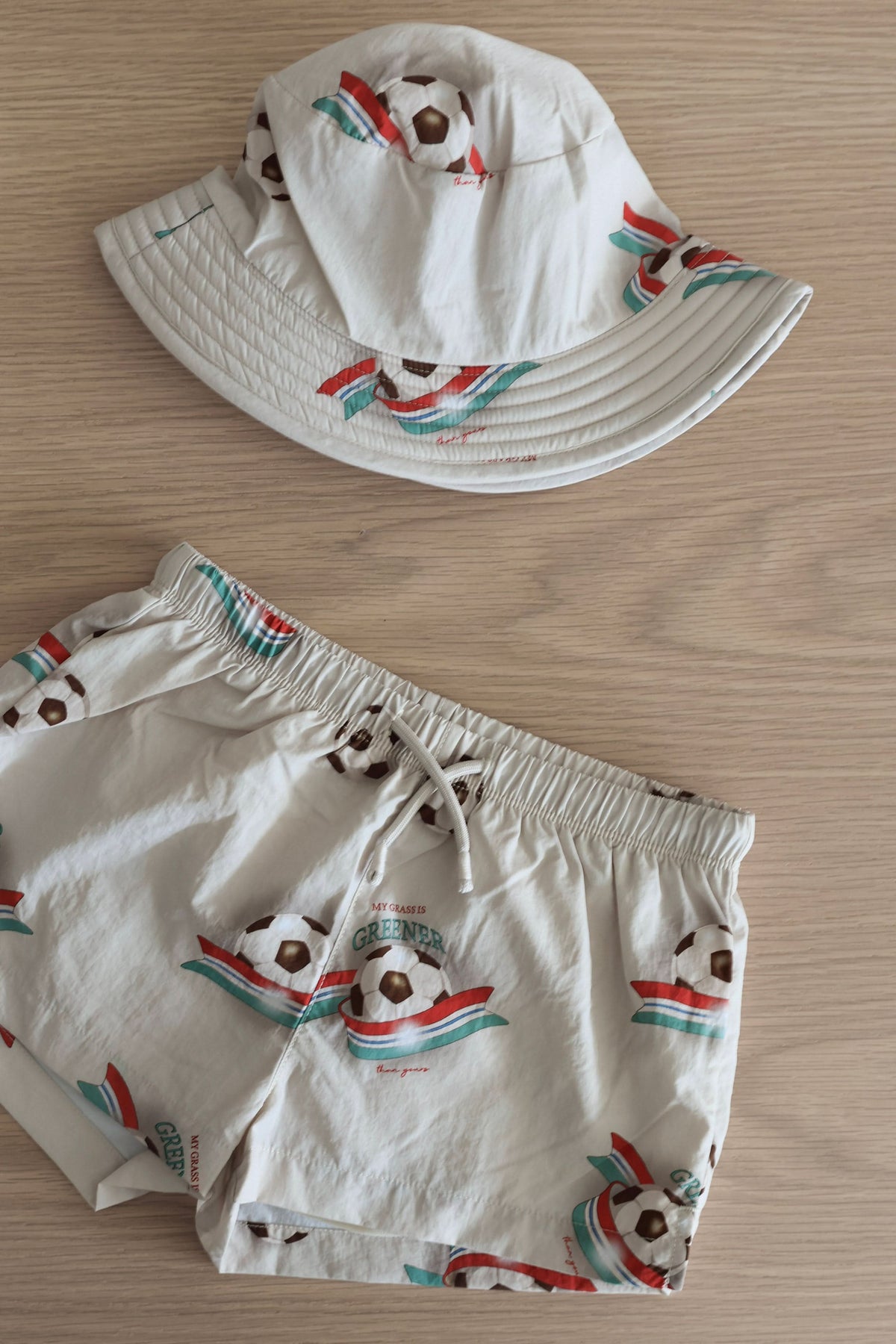 Pomio Bucket Hat - Kick It